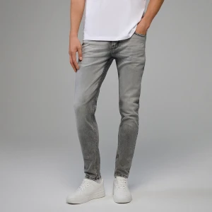 Jeansy slim fit z przetarciami grafitowe House