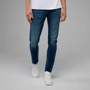 Jeansy slim fit z przetarciami granatowe House