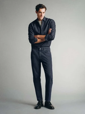 Jeansy wyprodukowane we Włoszech, fason tapered, tkanina Candiani black denim - Mężczyzna - MANGO MAN