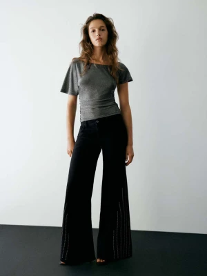 Jeansy wide leg z ćwiekami czarny - Teen - MANGO TEEN
