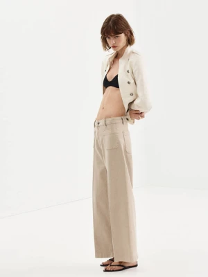Jeansy wide leg z naszytymi kieszeniami piaskowy - Kobieta - - MANGO