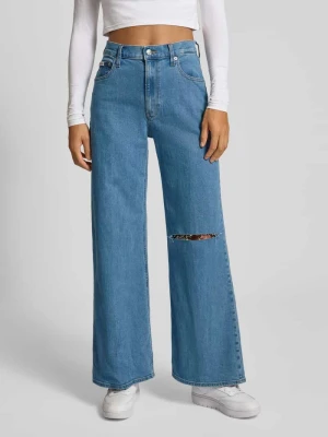 Jeansy z bardzo wysokim stanem, szeroką nogawką i przetarciami Calvin Klein Jeans