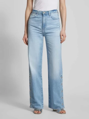 Jeansy z szeroką nogawką i naszywką z logo model ‘PAZ’ Guess