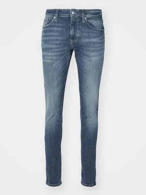 Jeansy Zwężane Tommy Jeans