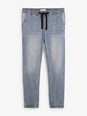 Joggery jeansowe o kroju regular fit z gumką w talii, tapered BonPrix szary