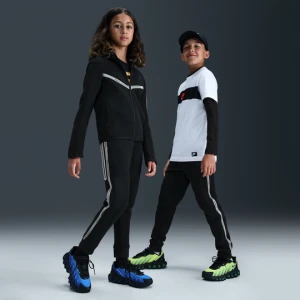 Joggery z akcentami o designie odbijającym światło dla dużych dzieci Nike Tech Fleece - Czerń