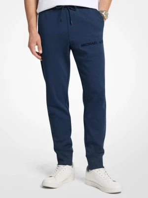Joggery z mieszanki bawełny z wytłoczonym logo Michael Kors PÓŁNOC (Niebieski)
