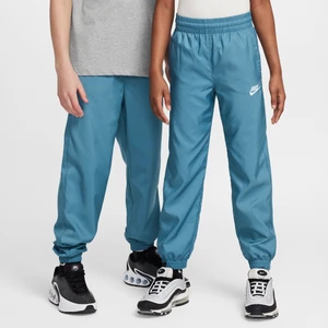 Joggery z tkaniny dla dużych dzieci Nike Sportswear Club - Niebieski