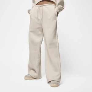 Jordan Brooklyn Fleece Open-Hem Pants kobiety Spodnie dresowe beż rozmiar Odzież