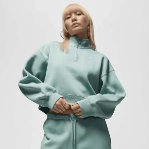 Jordan Brooklyn Fleece Quarter-Zip Top kobiety Bluzy turkusowy rozmiar Odzież