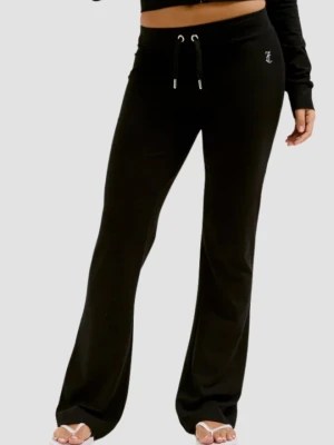 JUICY COUTURE Czarne damskie spodnie dresowe Single Jersey Apollo Low Rise, Rozmiar L