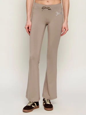 Juicy Couture Spodnie dresowe APOLLO | flare fit