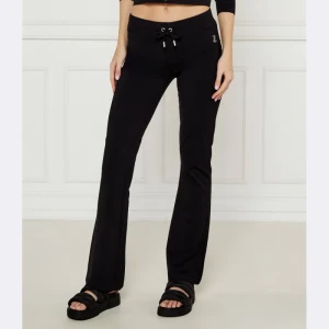 Juicy Couture Spodnie dresowe APOLLO | flare fit | low rise