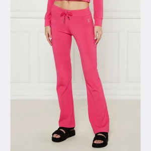 Juicy Couture Spodnie dresowe APOLLO | flare fit | low rise