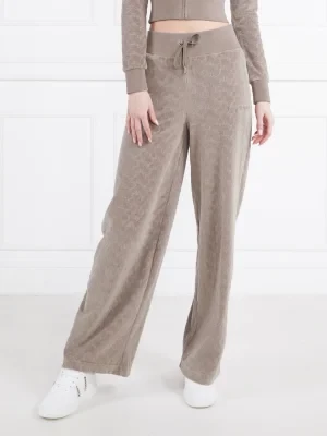 Juicy Couture Spodnie dresowe BEXLEY | flare fit