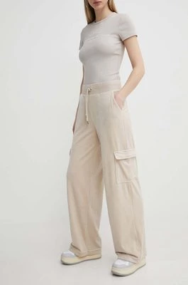 Juicy Couture spodnie dresowe welurowe kolor beżowy z aplikacją