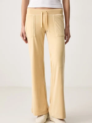 Juicy Couture spodnie flare damskie welurowe LAYLA LOW RISE POCKET GOLD beżowy