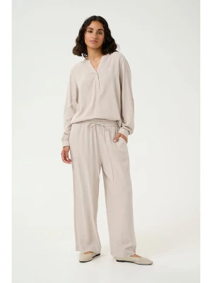 Kaffe Spodnie "Milia" w kolorze kremowym rozmiar: 36