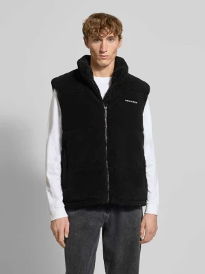 Kamizelka pikowana ze stójką i wyhaftowanym logo model ‘LANDIN’ Pegador