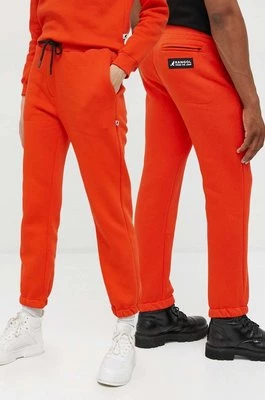 Kangol spodnie dresowe unisex kolor pomarańczowy gładkie