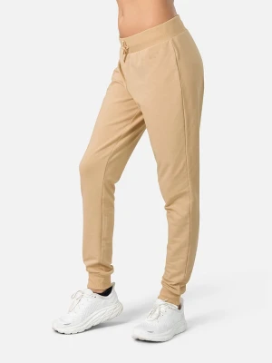 KARI TRAA Spodnie dresowe w kolorze beżowym rozmiar: L