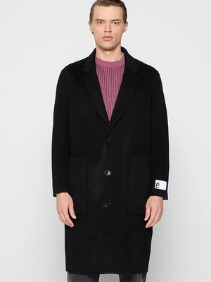 Klasyczny płaszcz Études