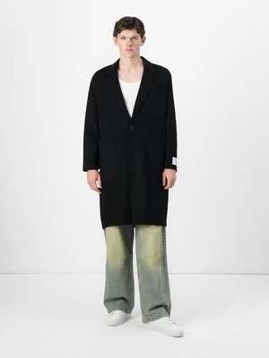 Klasyczny płaszcz Études