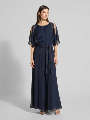 Kombinezon z lejącego materiału z wiązanym paskiem Vera Mont