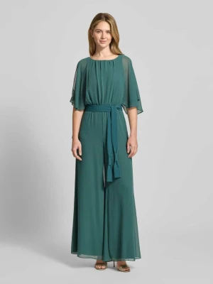 Kombinezon z lejącego materiału z wiązanym paskiem Vera Mont