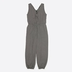 Kombinezon z nogawkami typu haremki kokardki efekt postrzępienia krata czarny BIMBA Y LOLA