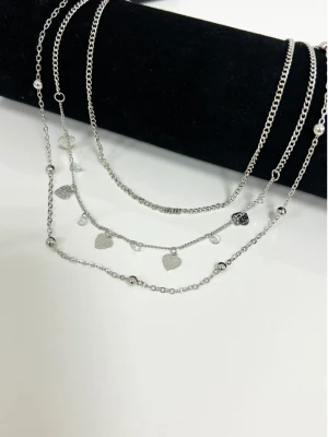 Komplet delikatnych naszyjników - srebrny  magmac 