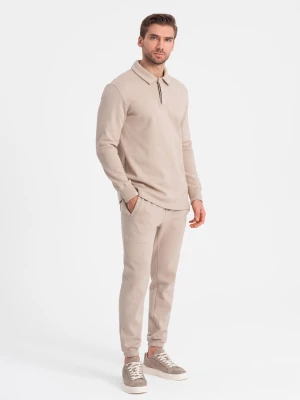 Zdjęcie produktu Komplet męski dresowy bluza z kołnierzem polo + spodnie - beżowy V2 - Rozmiar: XXL Ombre Clothing
