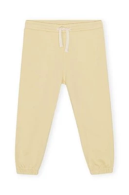 Konges Sløjd spodnie dresowe dziecięce kolor żółty gładkie