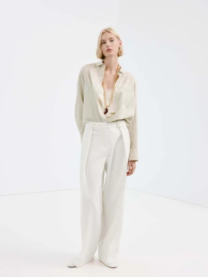 Koszula z lyocellu z kieszenią pastelowy żółty - Kobieta - - MANGO