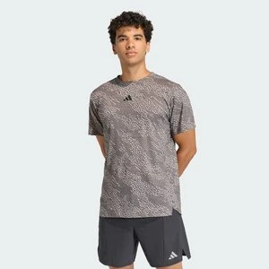 Zdjęcie produktu Koszulka D4T PrimeLift Aop Adidas brązowy