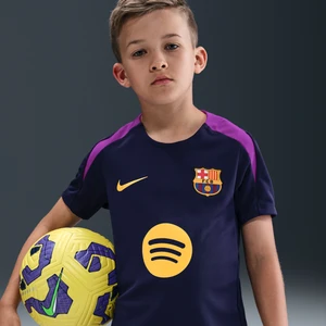 Zdjęcie produktu Koszulka piłkarska z krótkim rękawem dla dużych dzieci Nike Dri-FIT FC Barcelona Strike - Fiolet