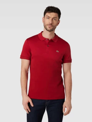Koszulka polo o kroju regular fit w jednolitym kolorze Lacoste