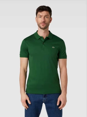 Koszulka polo o kroju regular fit w jednolitym kolorze Lacoste