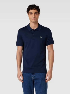 Koszulka polo o kroju regular fit w jednolitym kolorze Lacoste