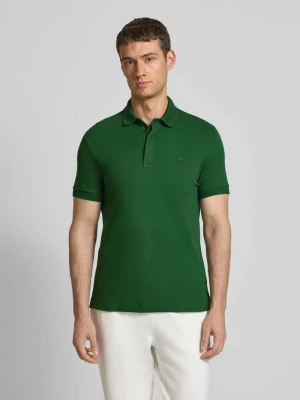 Koszulka polo o kroju regular fit z detalem z logo Lacoste