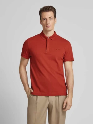 Koszulka polo o kroju regular fit z detalem z logo Lacoste