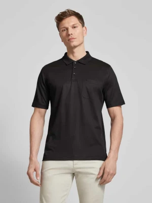 Koszulka polo o kroju regular fit z kieszenią na piersi Christian Berg Men