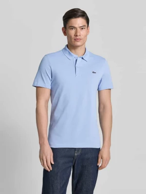 Koszulka polo o kroju regular fit z mieszanki bawełny Lacoste