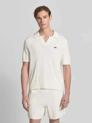 Koszulka polo o kroju regular fit z mieszanki bawełny Lacoste Złamany biały