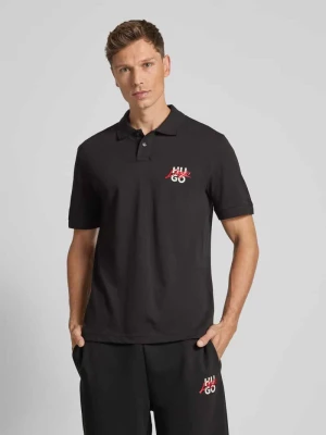 Koszulka polo o kroju regular fit z nadrukiem z logo i wyhaftowanym logo HUGO