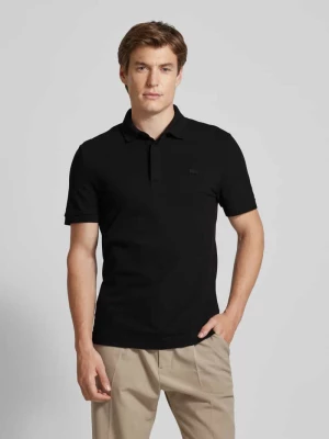 Koszulka polo o kroju regular fit z naszywką logo model ‘CORE’ Lacoste