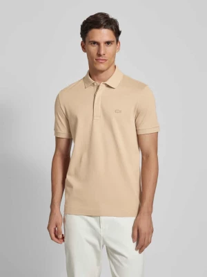 Koszulka polo o kroju regular fit z naszywką logo model ‘CORE’ Lacoste