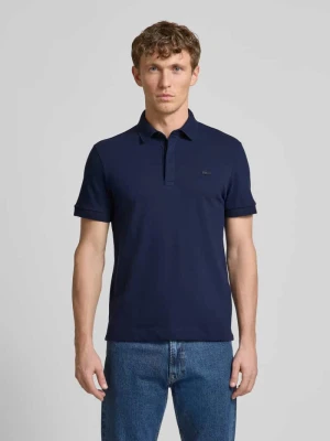 Koszulka polo o kroju regular fit z naszywką z logo Lacoste
