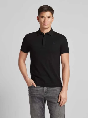 Koszulka polo o kroju regular fit z naszywką z logo model ‘CORE PIQUE’ Lacoste