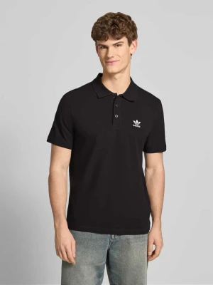 Koszulka polo o kroju regular fit z wyhaftowanym logo adidas Originals